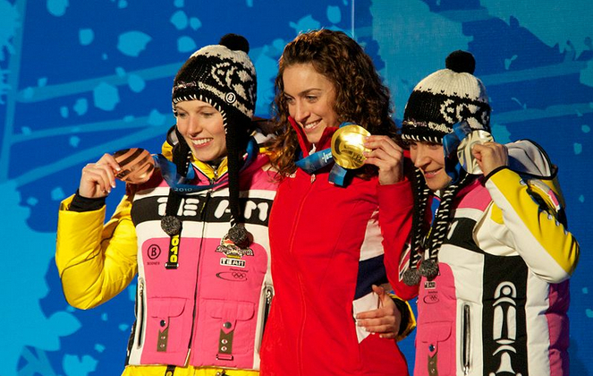 The person on the left is the bronze medalist and the one on the right is the silver. Notice the different smiles.